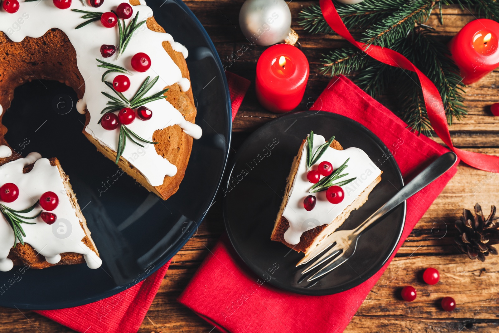 Photo of Flat lay composition with traditional homemade Christmas cake on wooden table