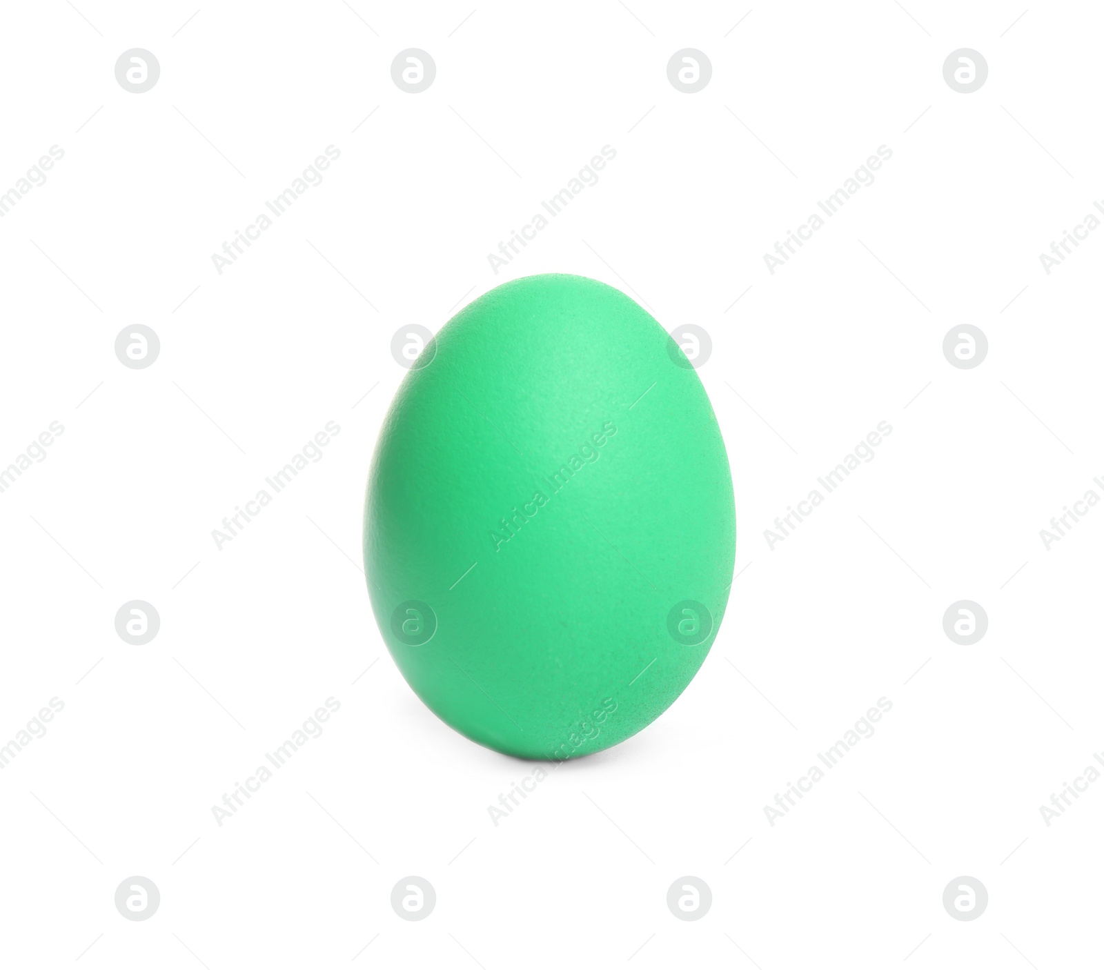 Photo of Green egg for Easter celebration isolated on white