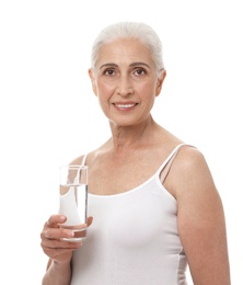 Photo of Portrait of beautiful mature woman with glass of water on white background