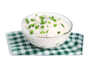 Photo of Fresh sour cream with onion and fabric on white background