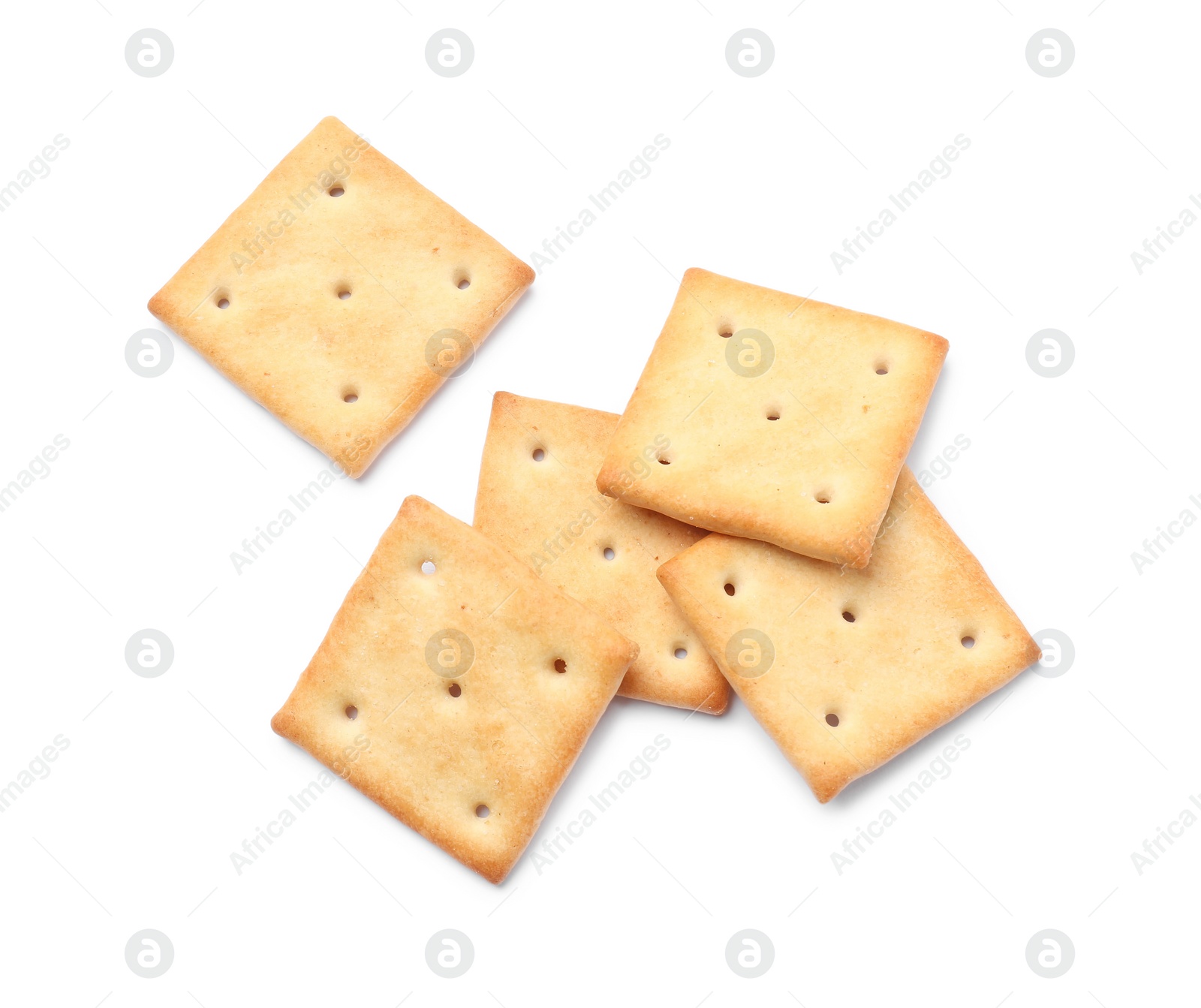 Photo of Tasty crispy square crackers isolated on white, top view