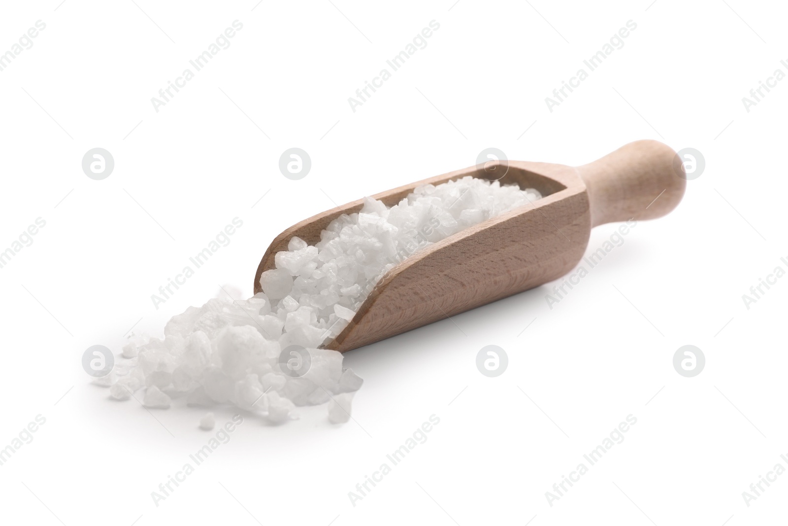 Photo of Natural salt in wooden scoop isolated on white