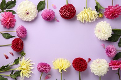 Photo of Frame made of beautiful dahlia flowers on violet background, flat lay. Space for text