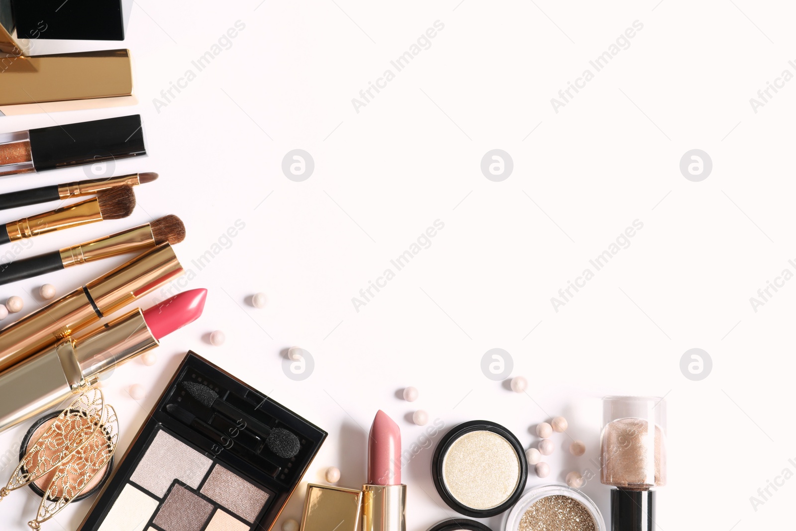 Photo of Set of luxury makeup products on white background, flat lay