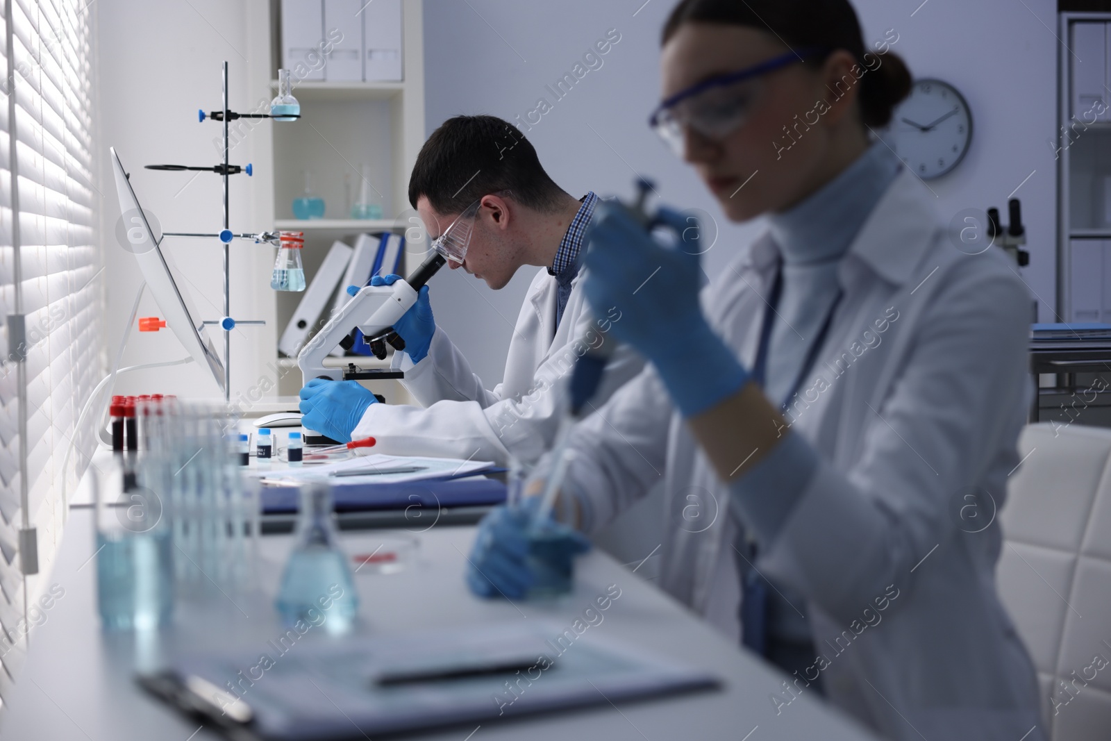 Photo of Scientists working with samples in laboratory. Medical research