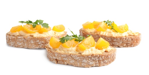 Photo of Tasty fresh tomato bruschettas on white background