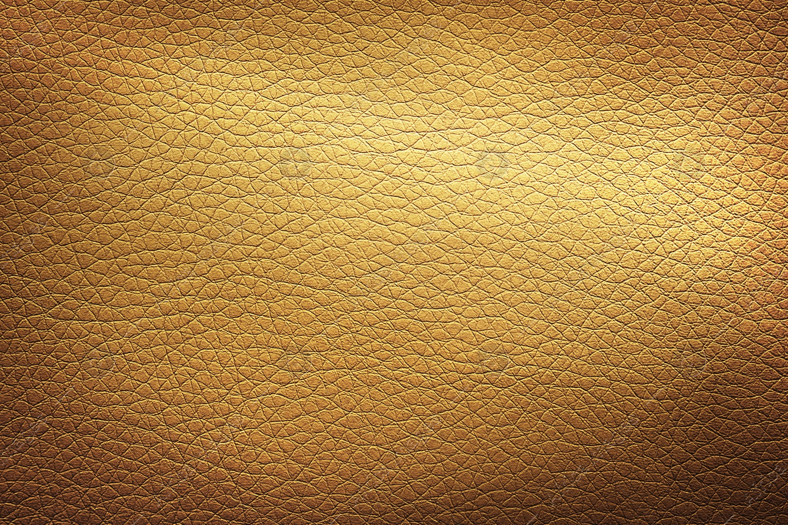 Image of Golden textured surface as background, closeup view