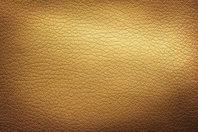 Image of Golden textured surface as background, closeup view