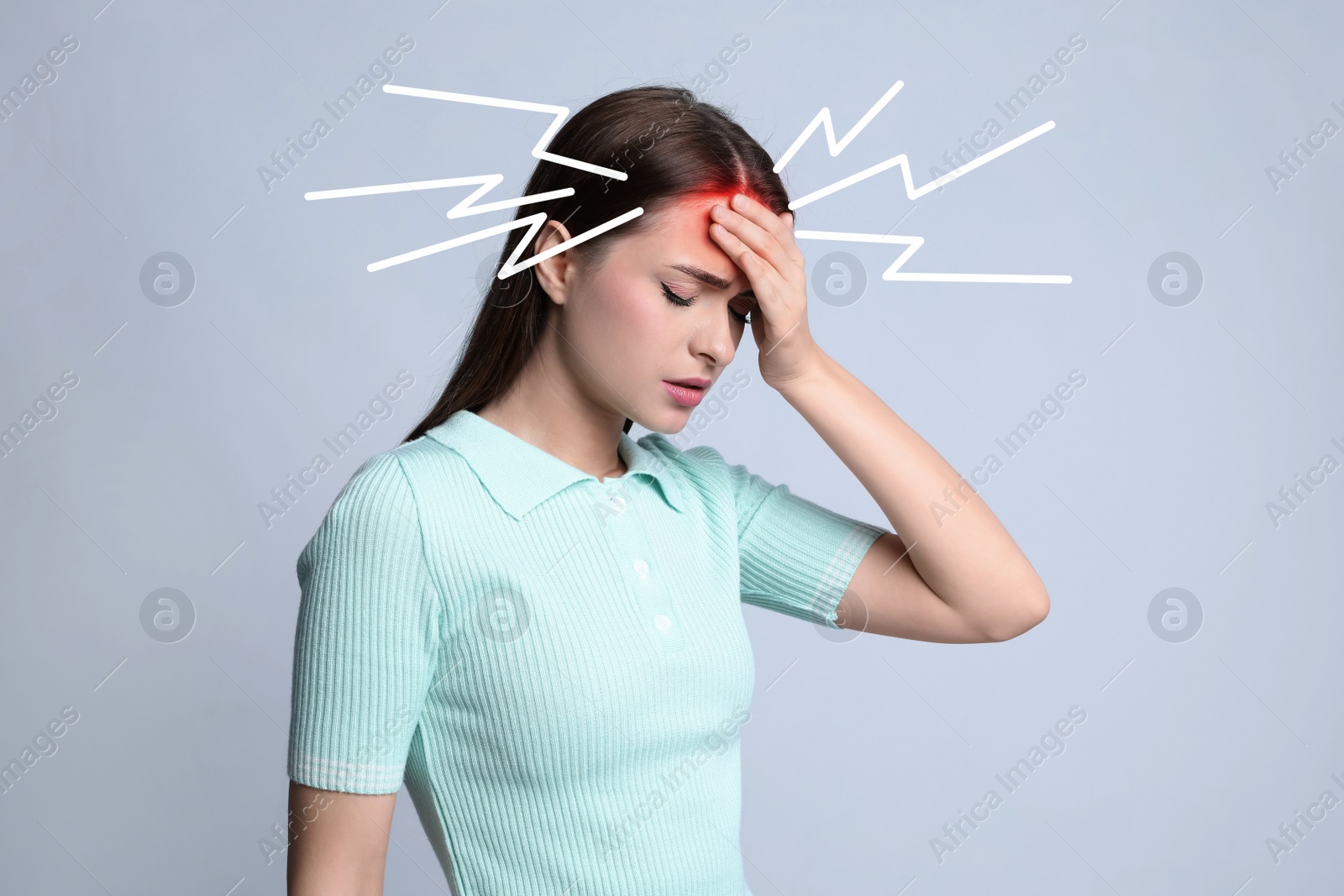 Image of Young woman having headache on light background. Illustration of lightnings representing severe pain