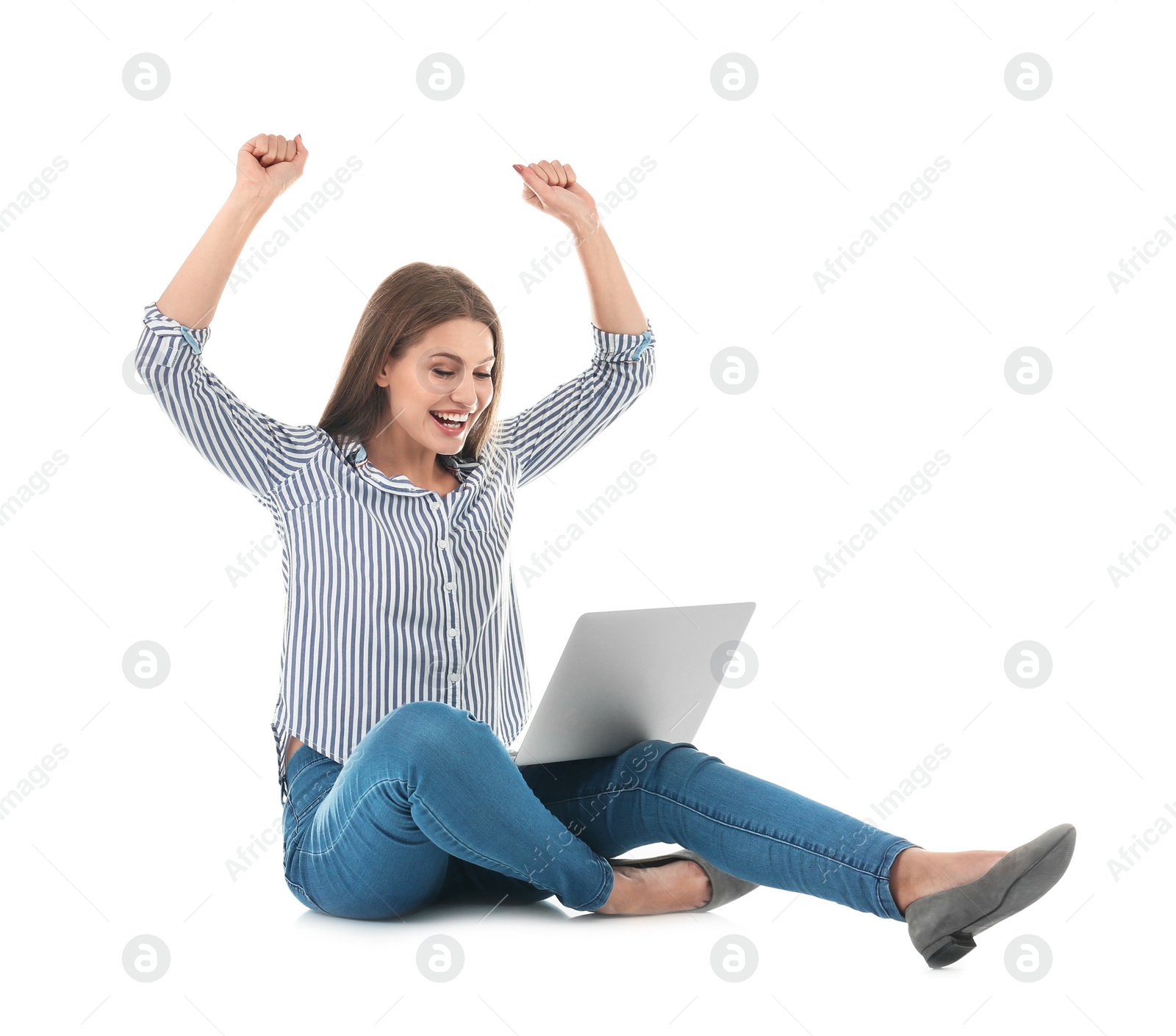 Photo of Emotional young woman with laptop celebrating victory on white background