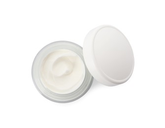 Face cream in glass jar on white background, top view
