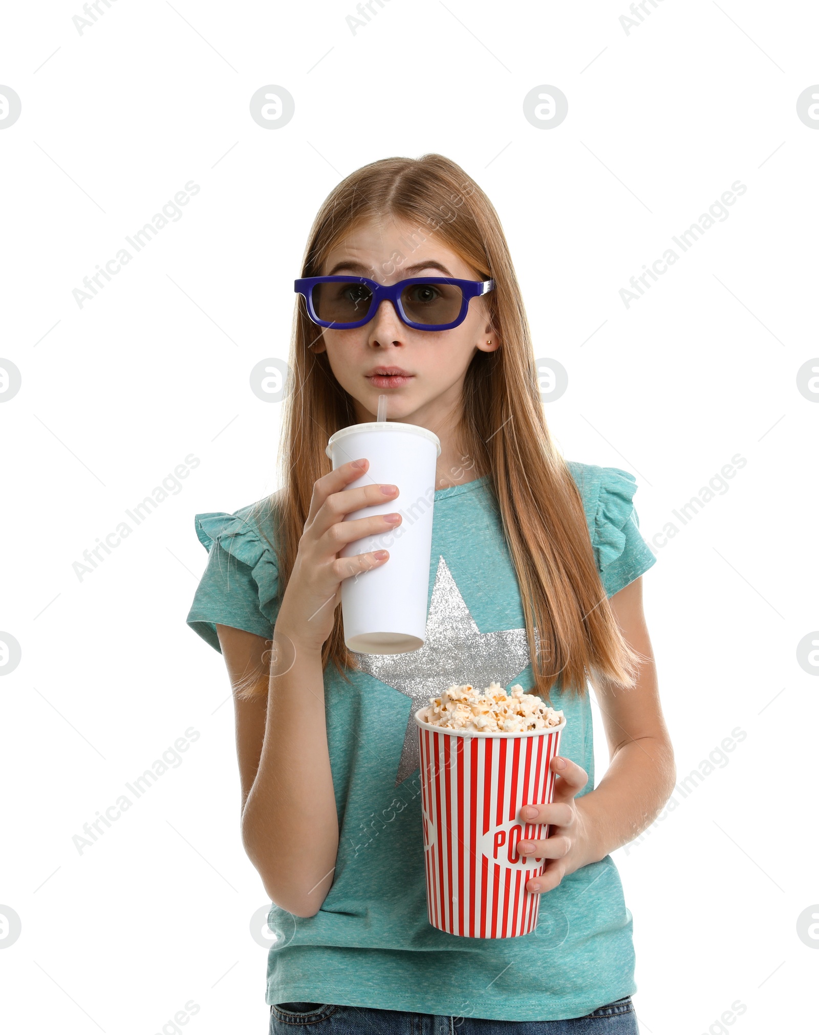 Photo of Emotional teenage girl with 3D glasses, popcorn and beverage during cinema show on white background