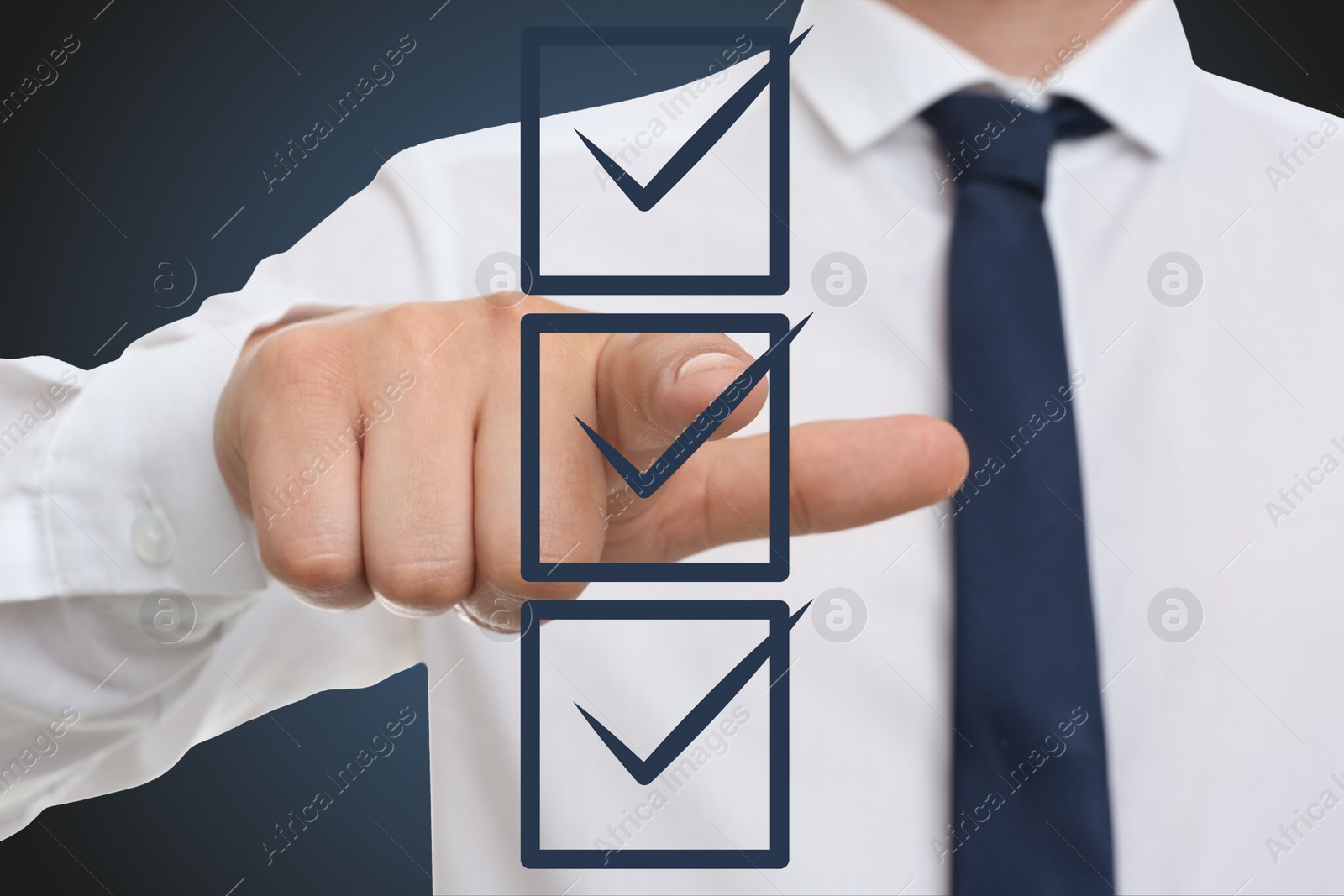 Image of Man pointing at check boxes with marks on virtual screen, closeup