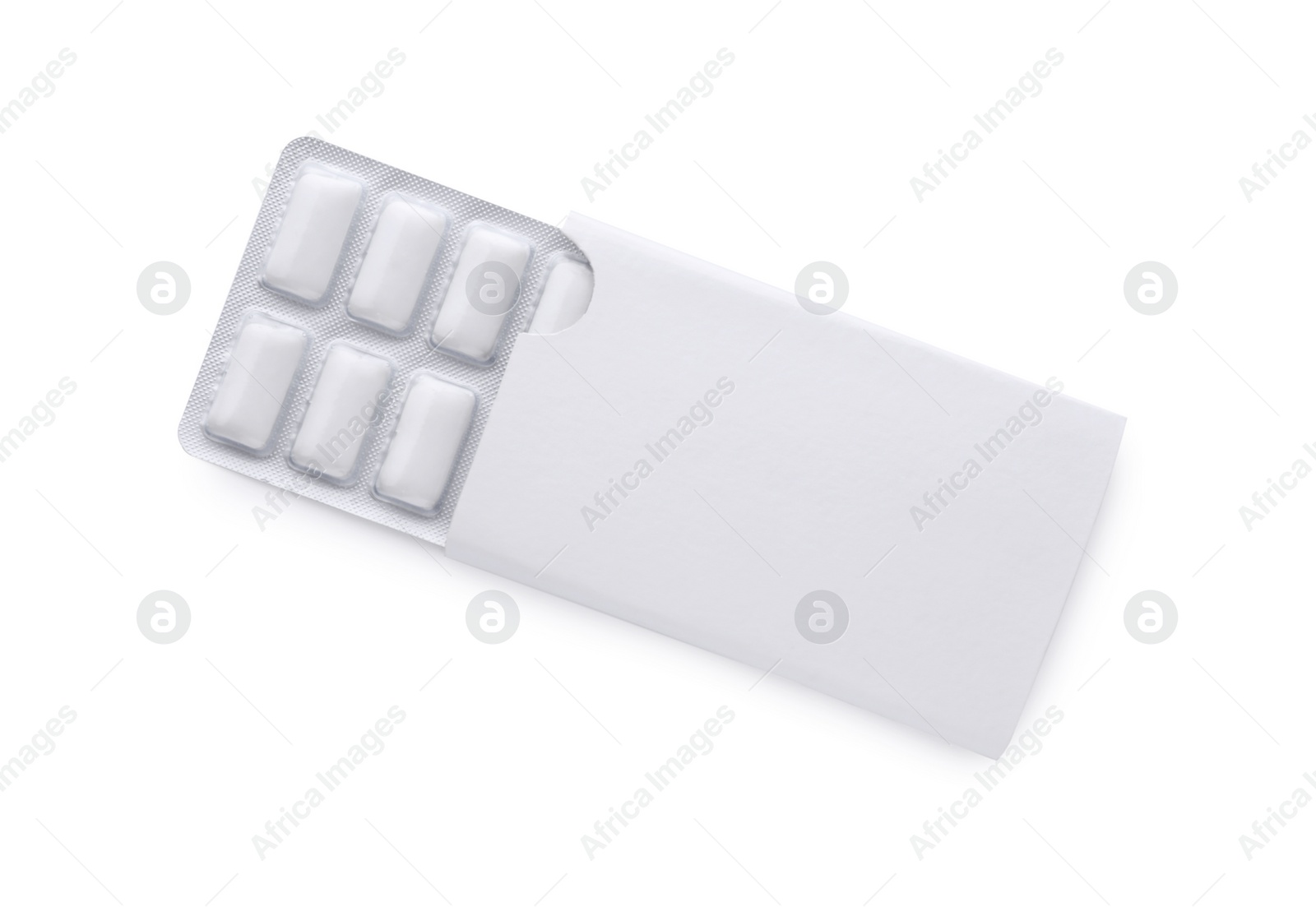 Photo of Blister with chewing gums on white background, top view