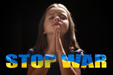 Image of Little girl praying on black background. Stop war in Ukraine