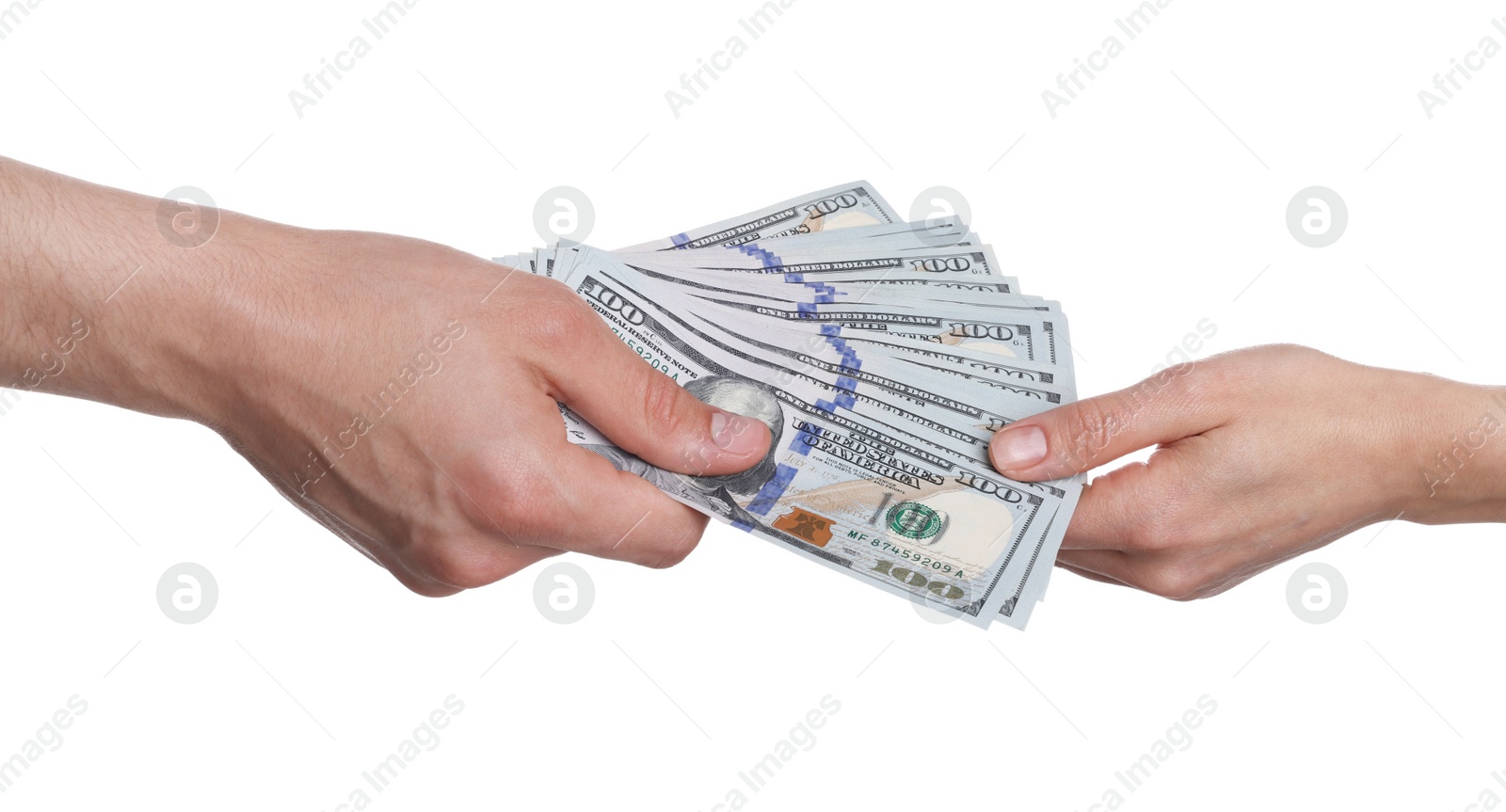 Photo of Money exchange. Man giving dollar banknotes to woman on white background, closeup