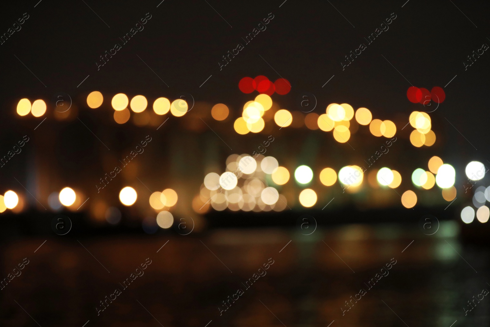 Photo of Blurred view of docks at night. Bokeh effect