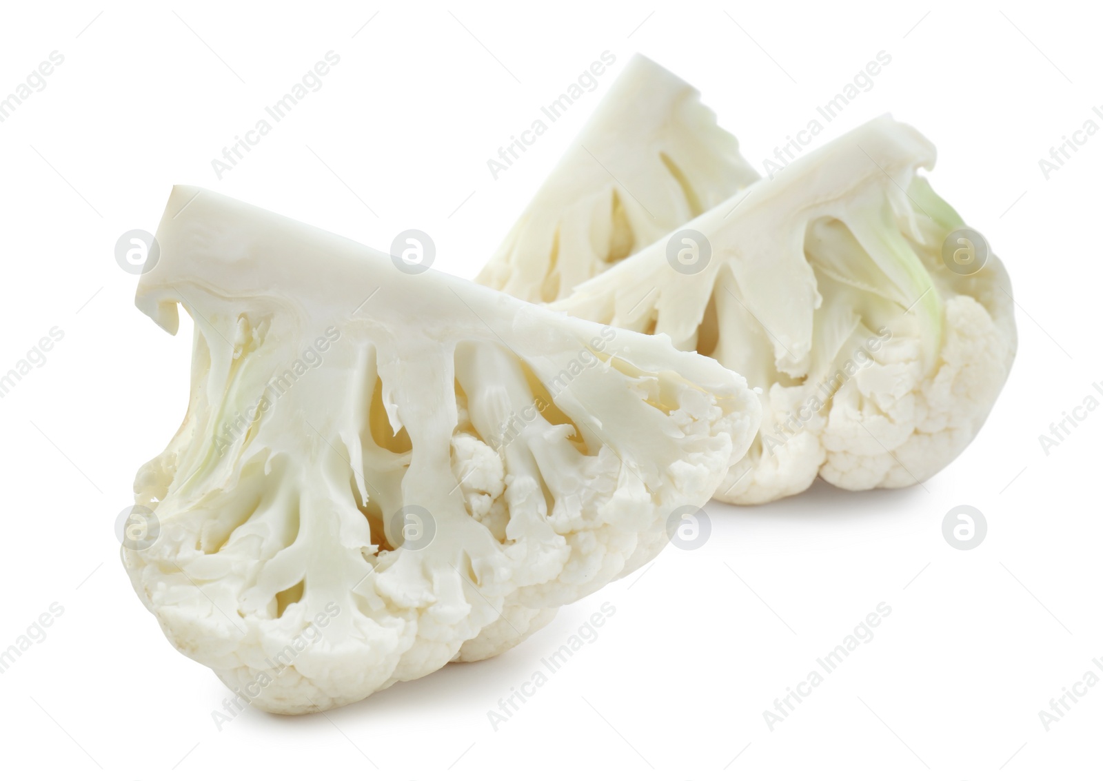 Photo of Cut fresh raw cauliflower on white background