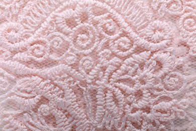 Photo of Beautiful beige lace as background, top view