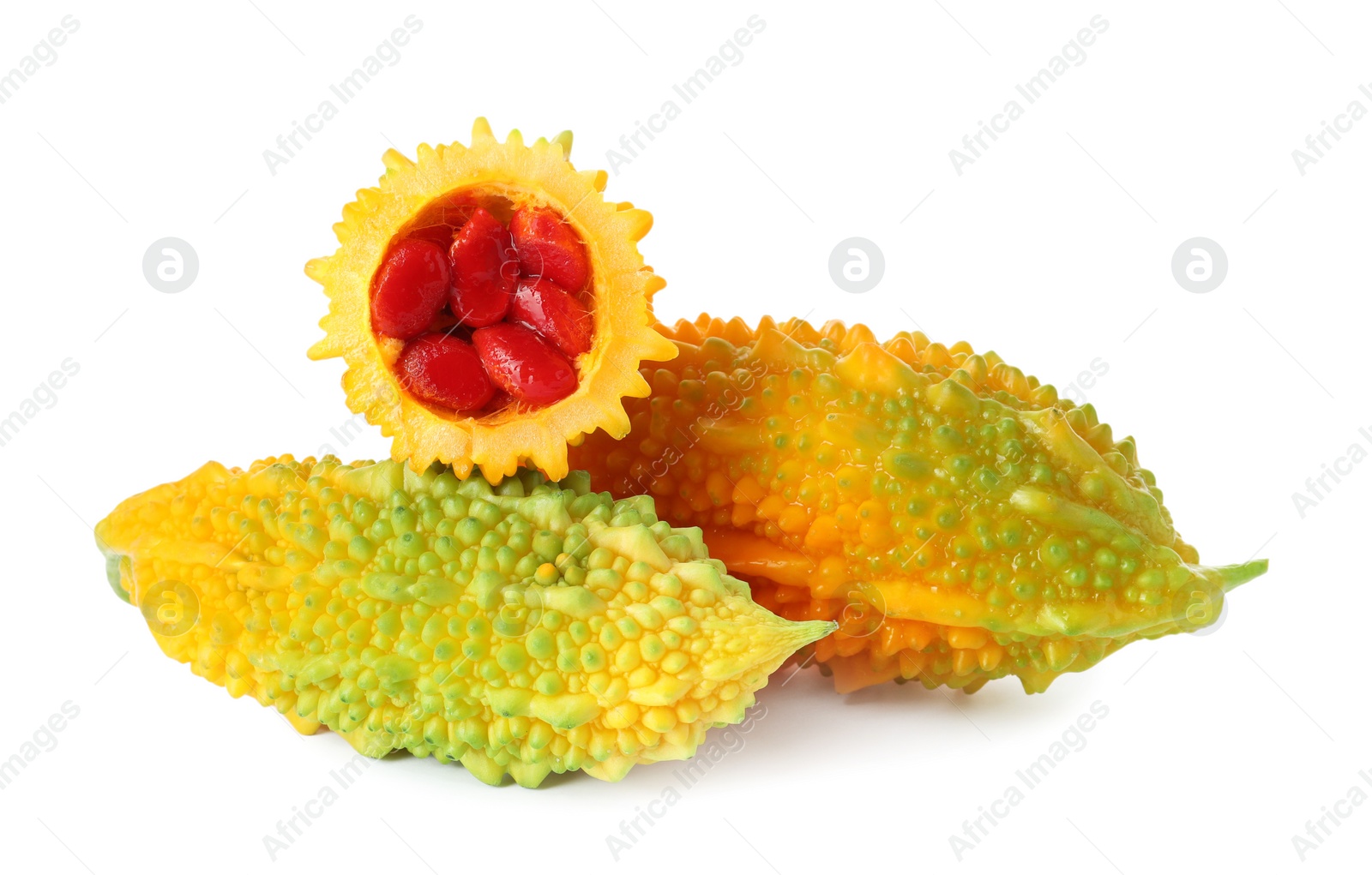 Photo of Fresh ripe bitter melons on white background