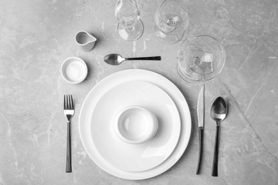 Photo of Stylish elegant table setting on grey background, top view