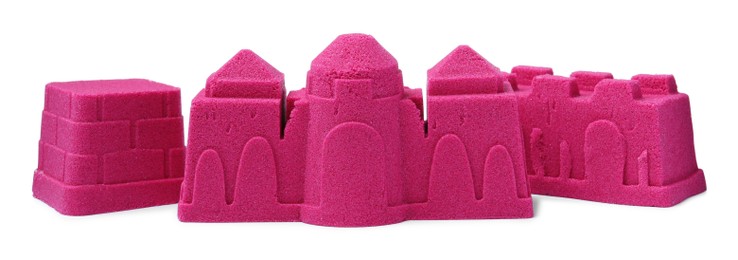 Castle made of kinetic sand on white background