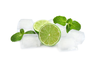 Photo of Crystal clear ice cubes, mint and lime on white background