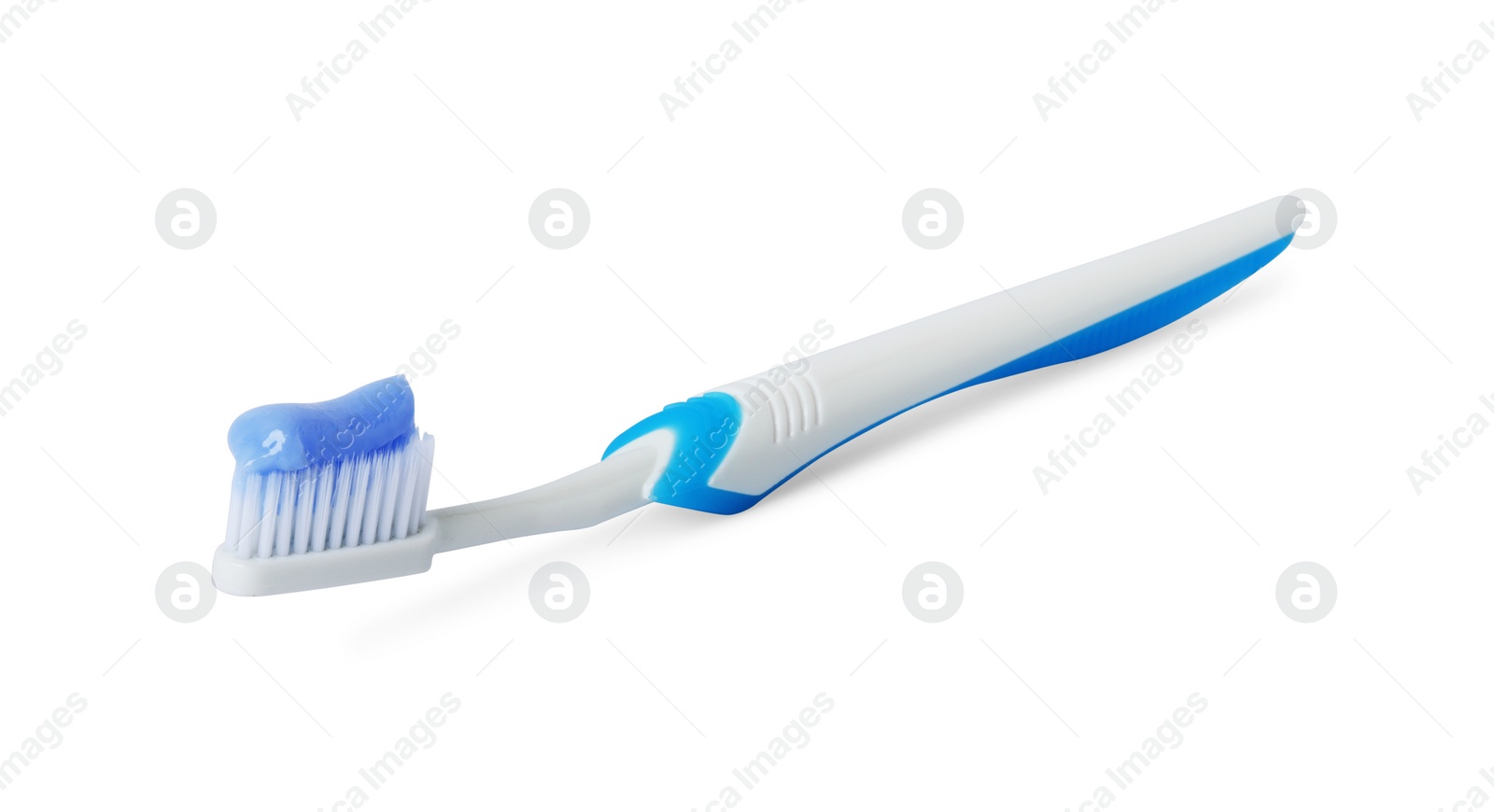 Photo of Plastic toothbrush with paste on white background