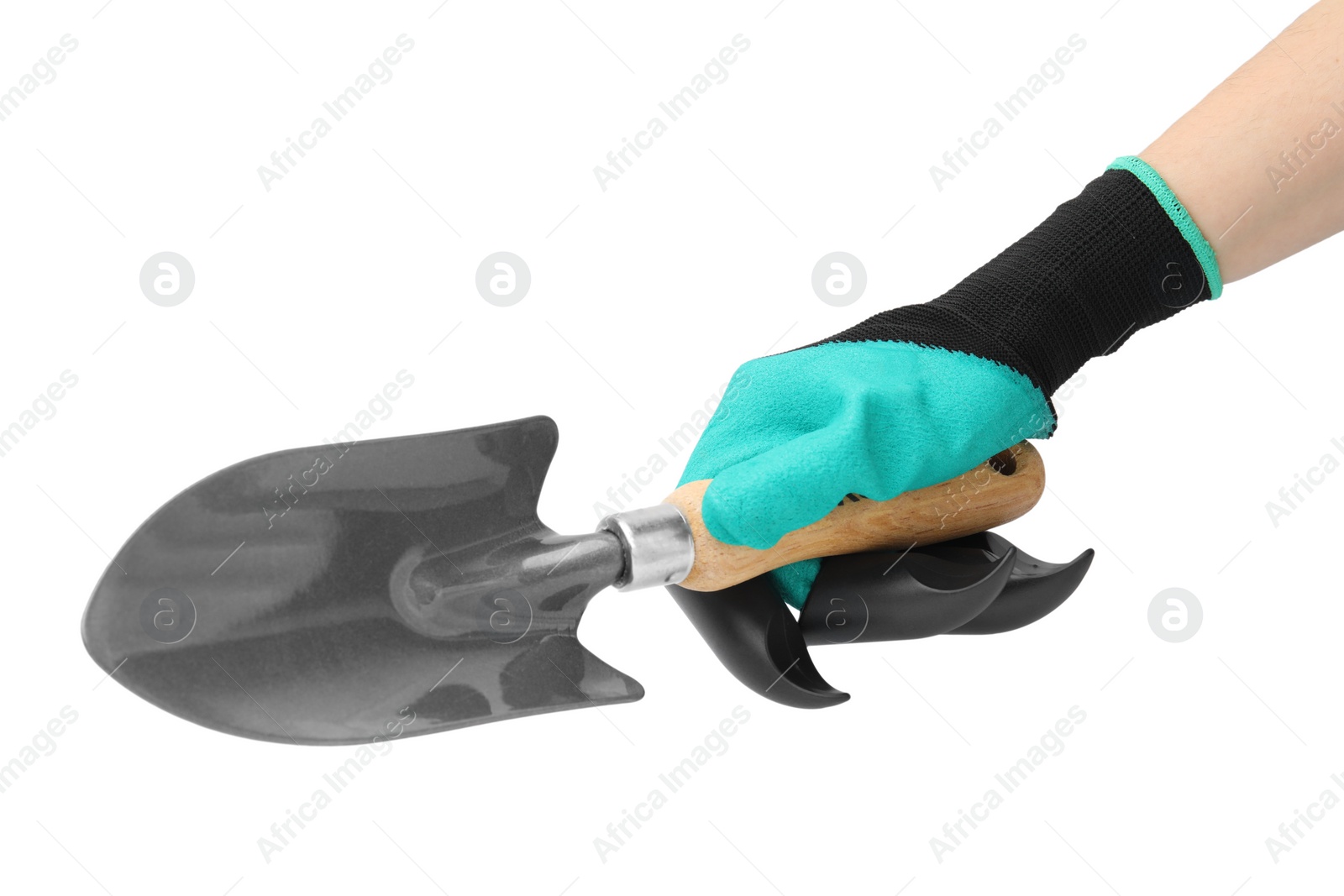 Photo of Woman in claw gardening glove holding trowel on white background, closeup