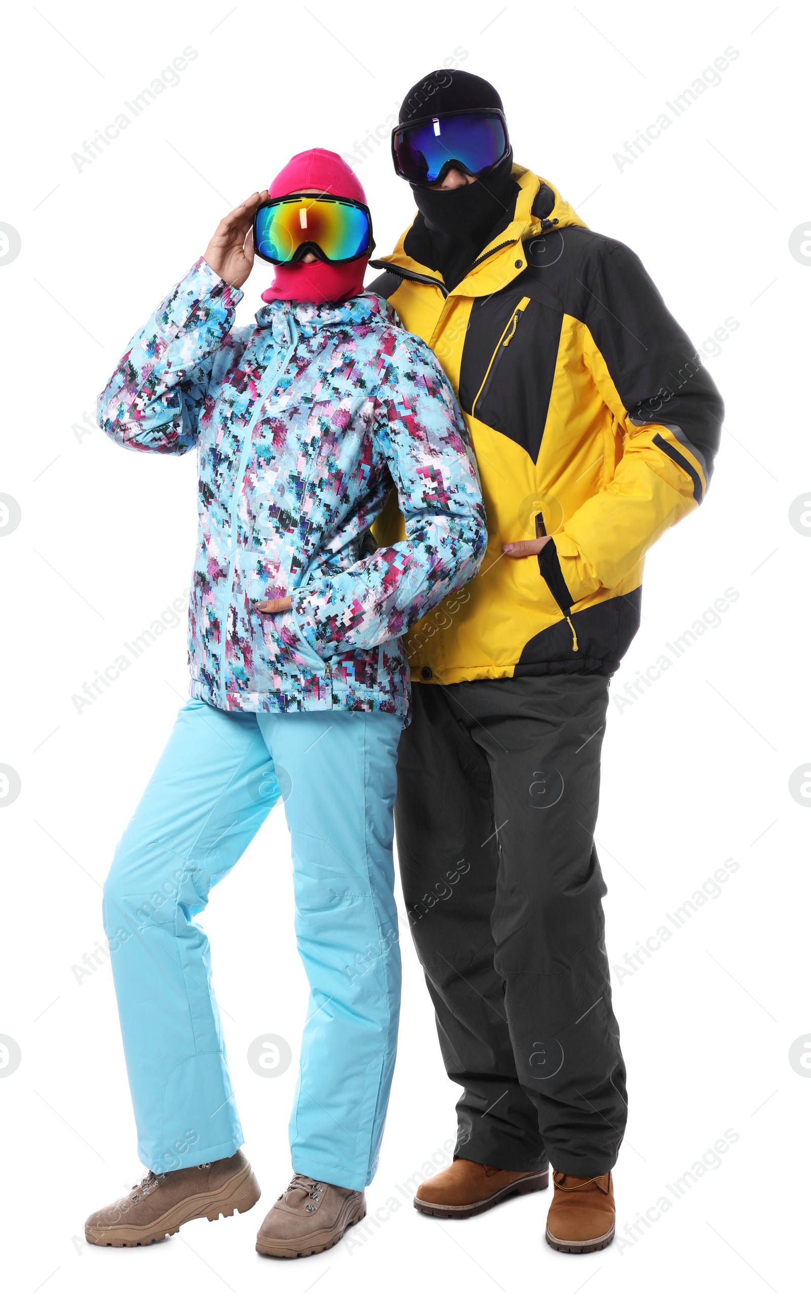 Photo of Couple wearing stylish winter sport clothes on white background
