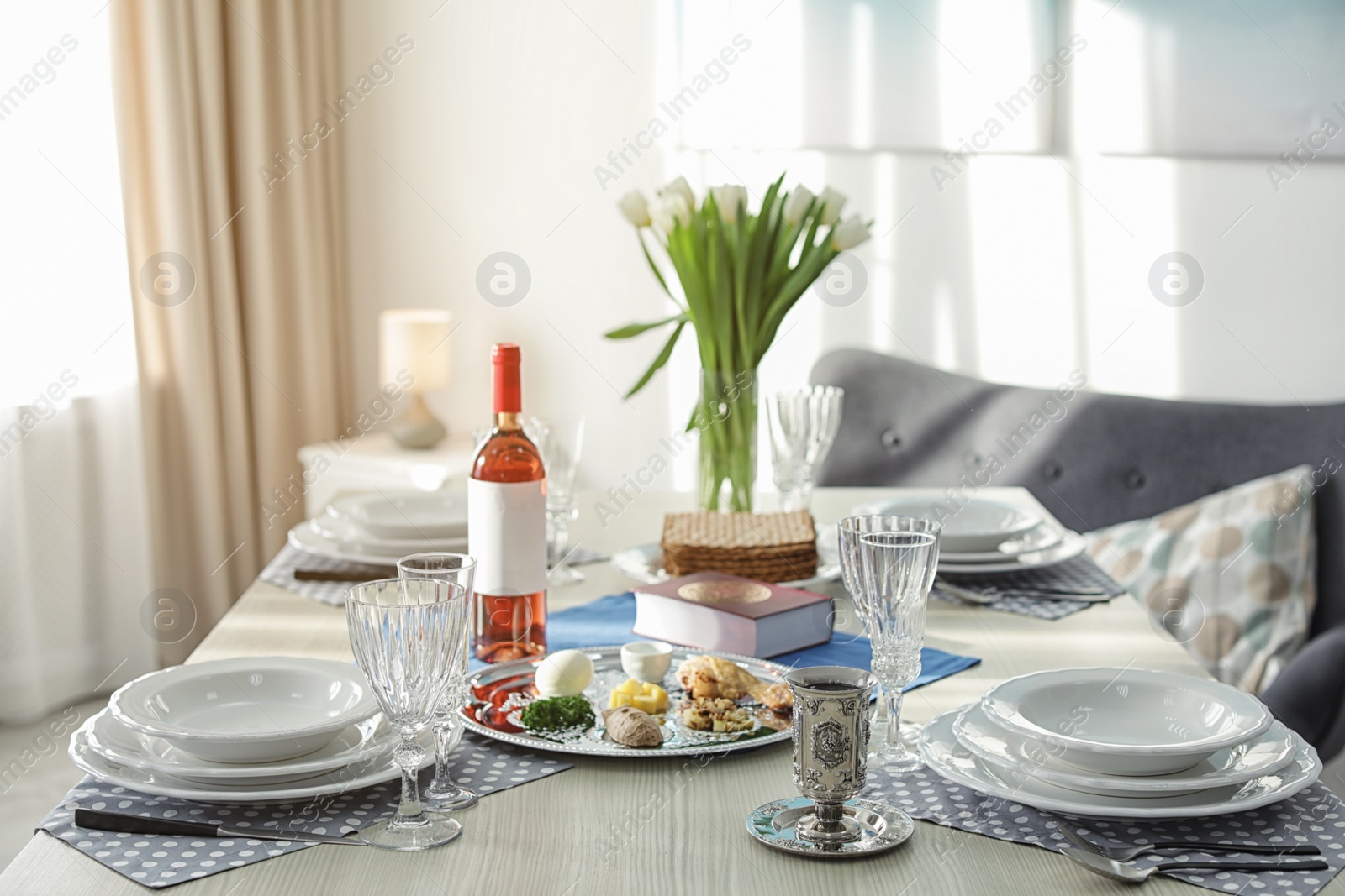 Photo of Table served for Passover (Pesach) Seder indoors