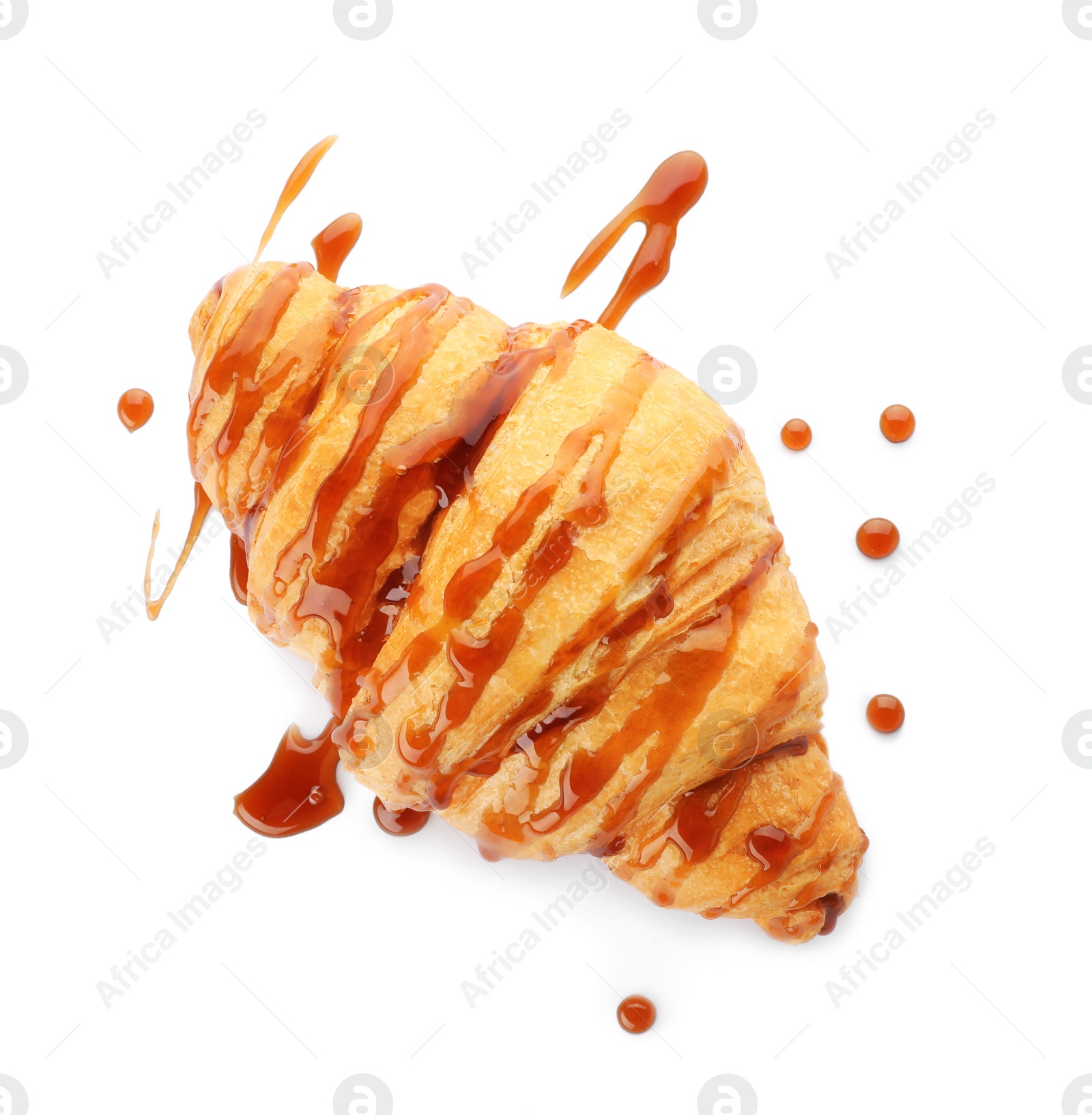 Photo of Tasty croissant with sauce on white background, top view