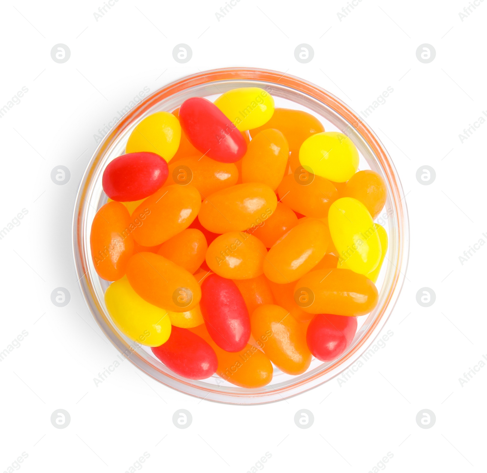 Photo of Bowl of delicious color jelly beans isolated on white, top view