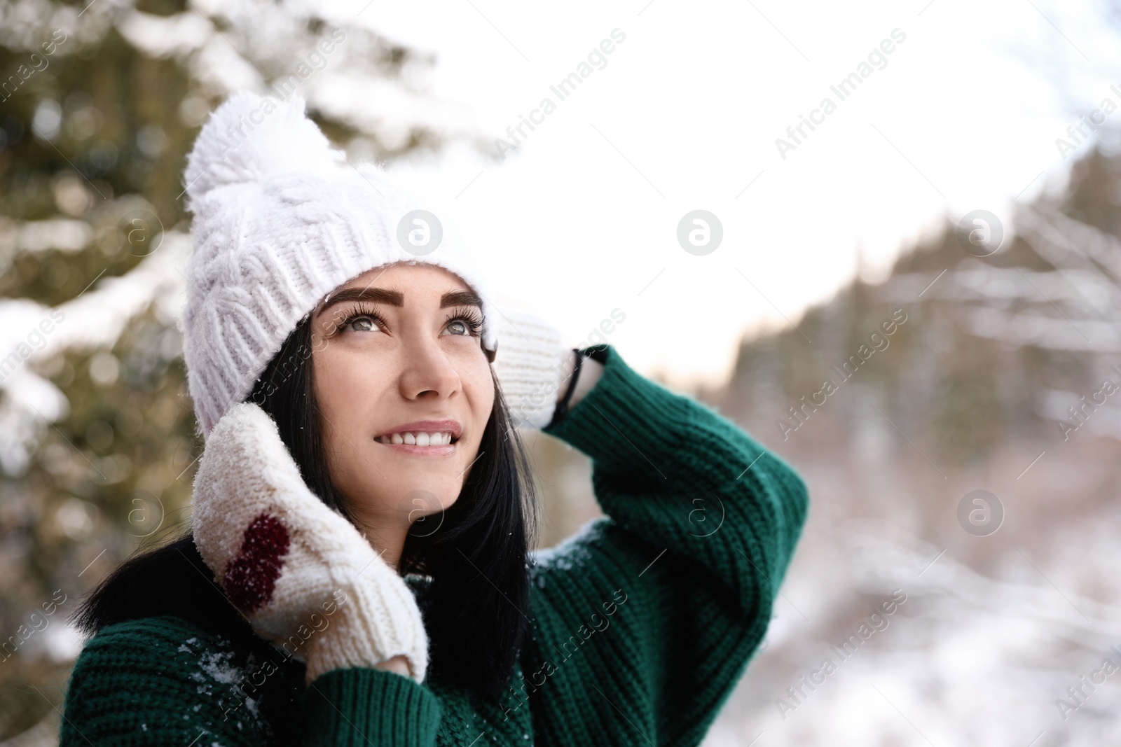 Photo of Portrait of beautiful young woman on winter day