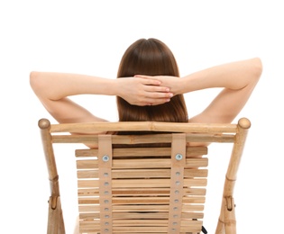 Young woman on sun lounger against white background. Beach accessories