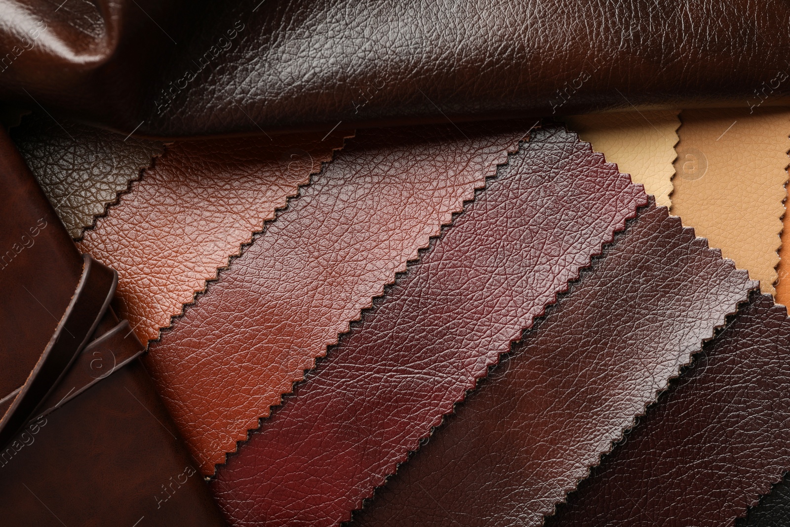 Photo of Different leather samples as background, closeup view