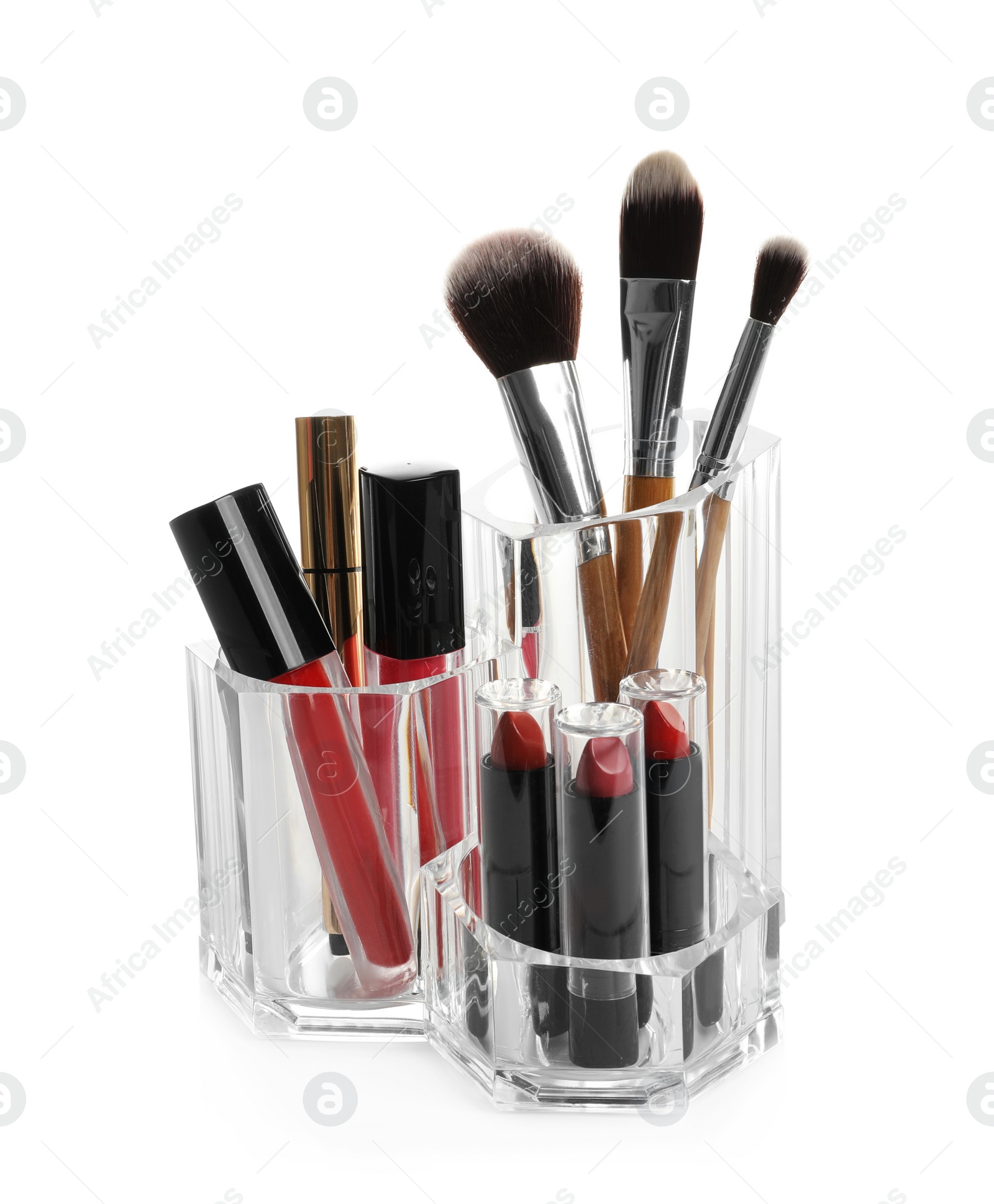 Photo of Lipstick holder with different makeup products on white background