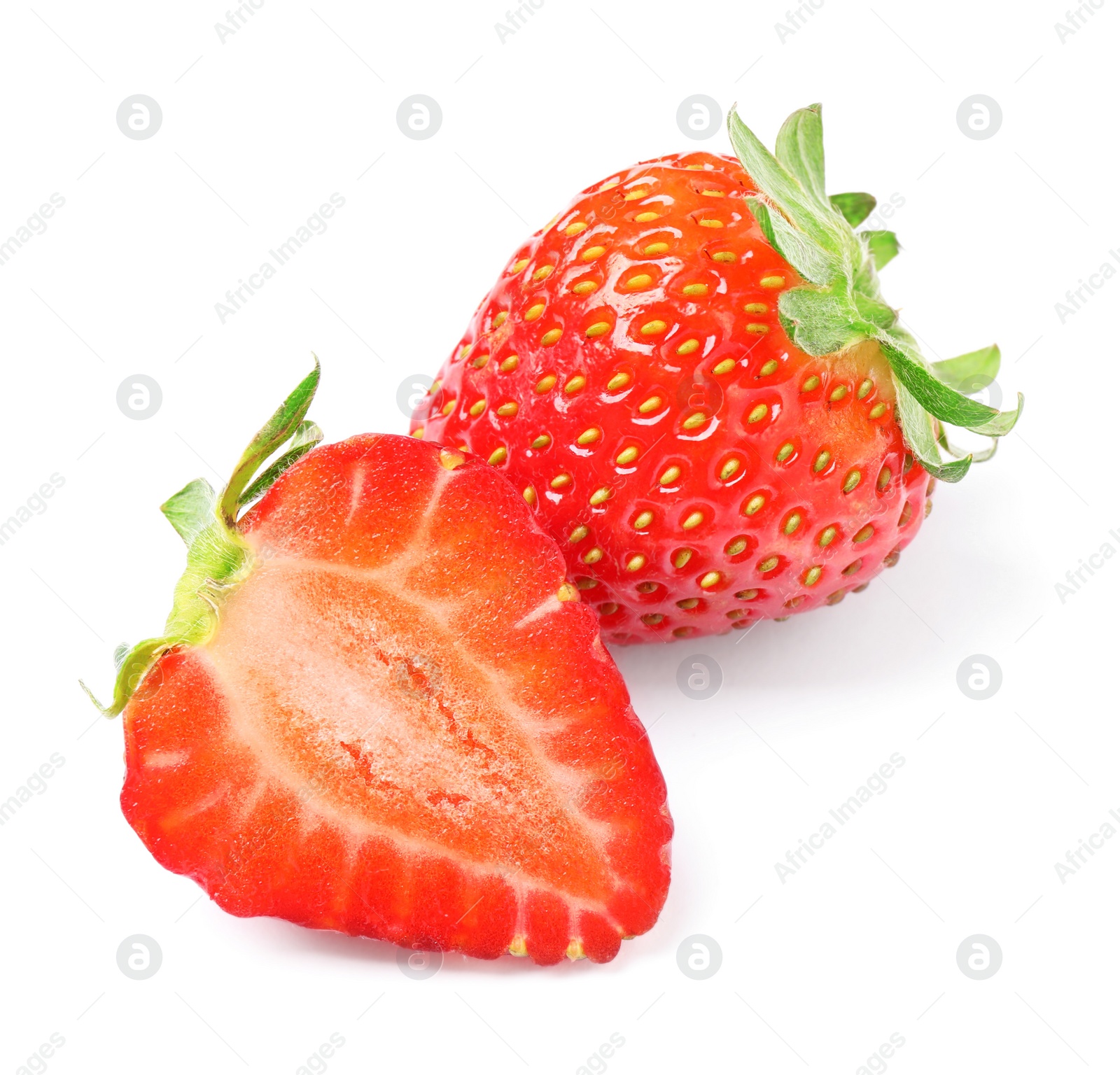 Photo of Delicious cut and whole strawberries on white background