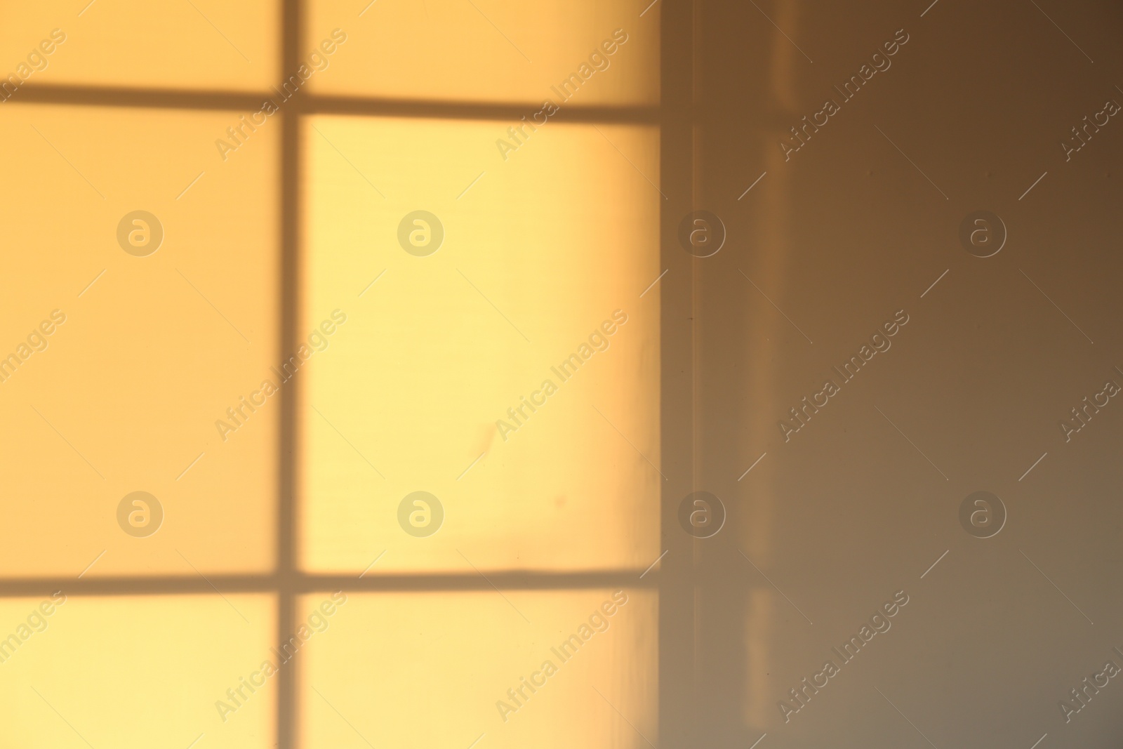 Photo of Light and shadow from window on wall