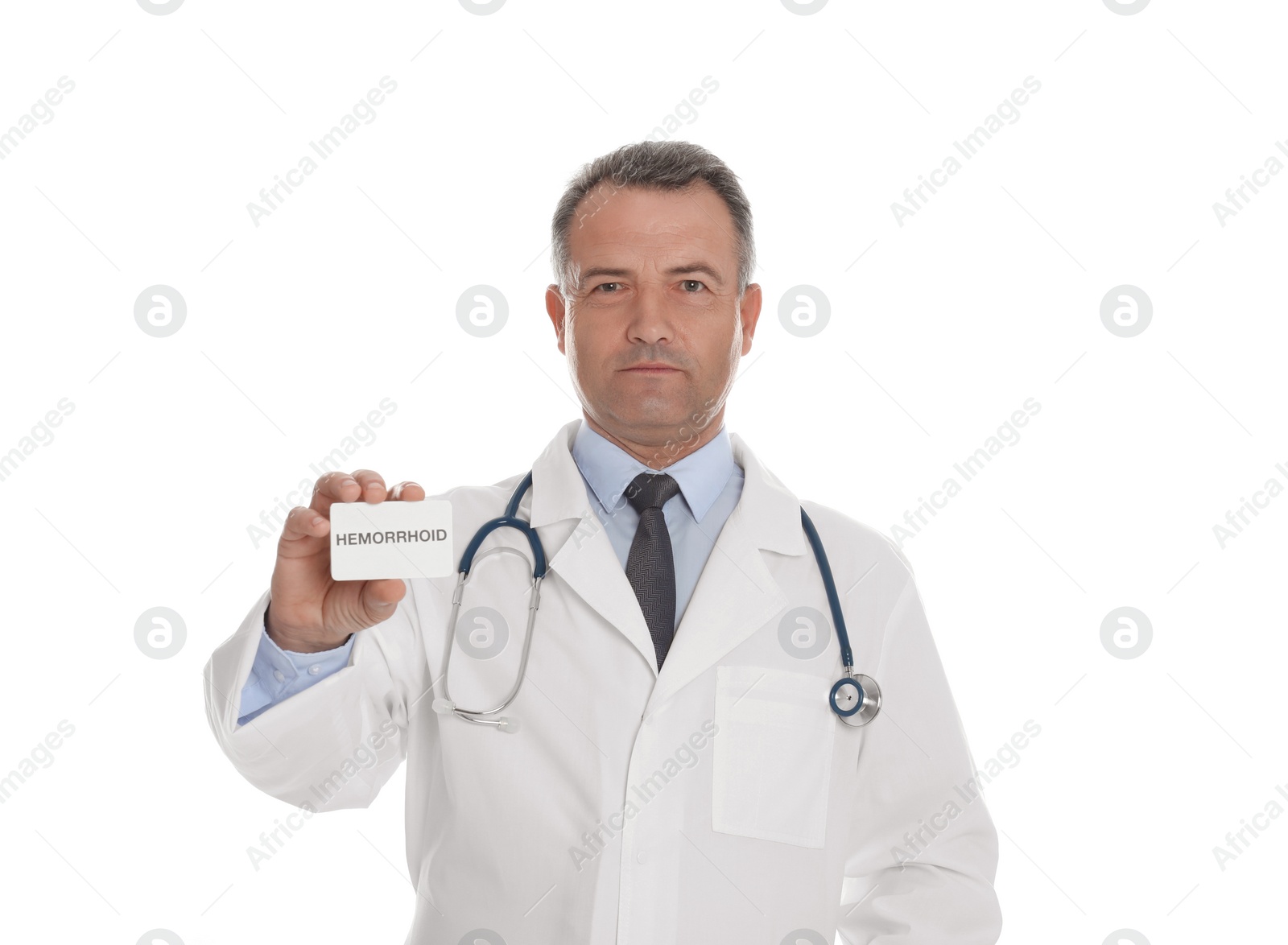 Photo of Doctor holding business card with word HEMORRHOID on white background