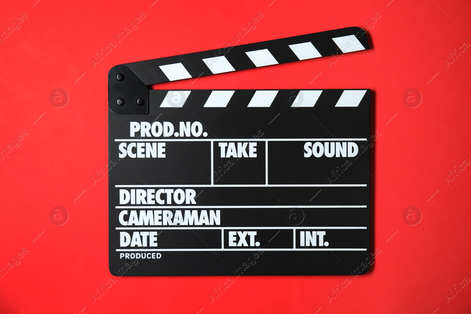 Photo of Clapperboard on color background, top view. Cinema production