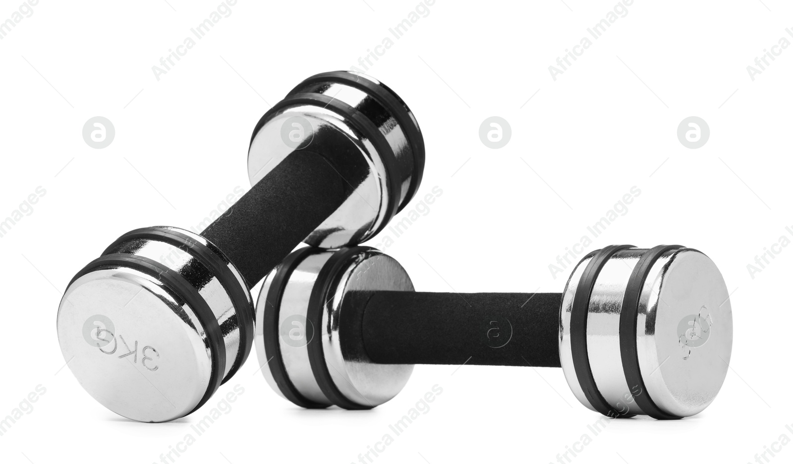 Photo of Metal dumbbells isolated on white. Sports equipment