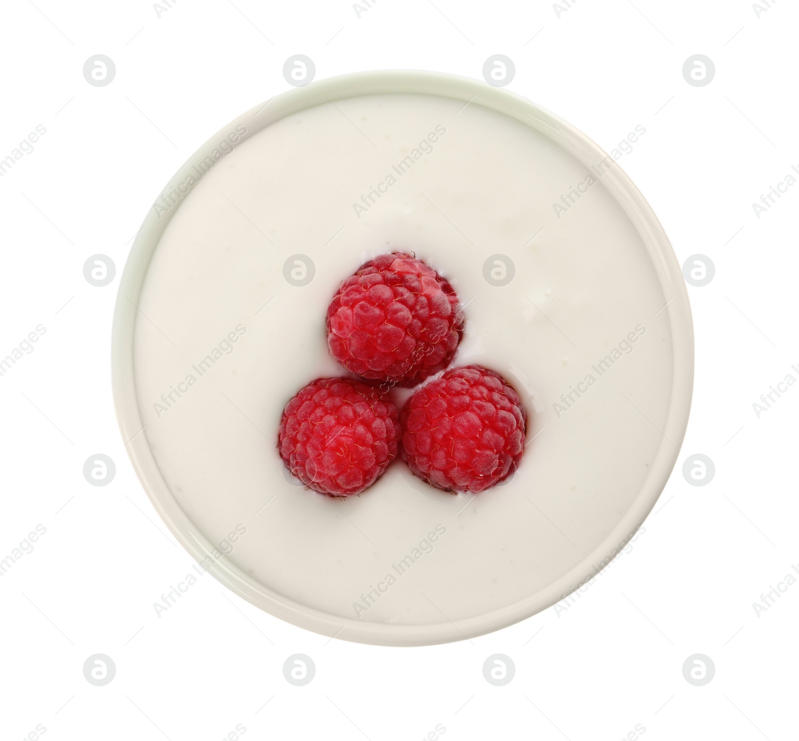 Photo of Delicious yogurt with raspberries in bowl isolated on white, top view