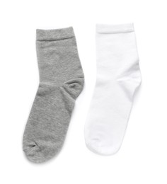 Photo of Different socks isolated on white, top view