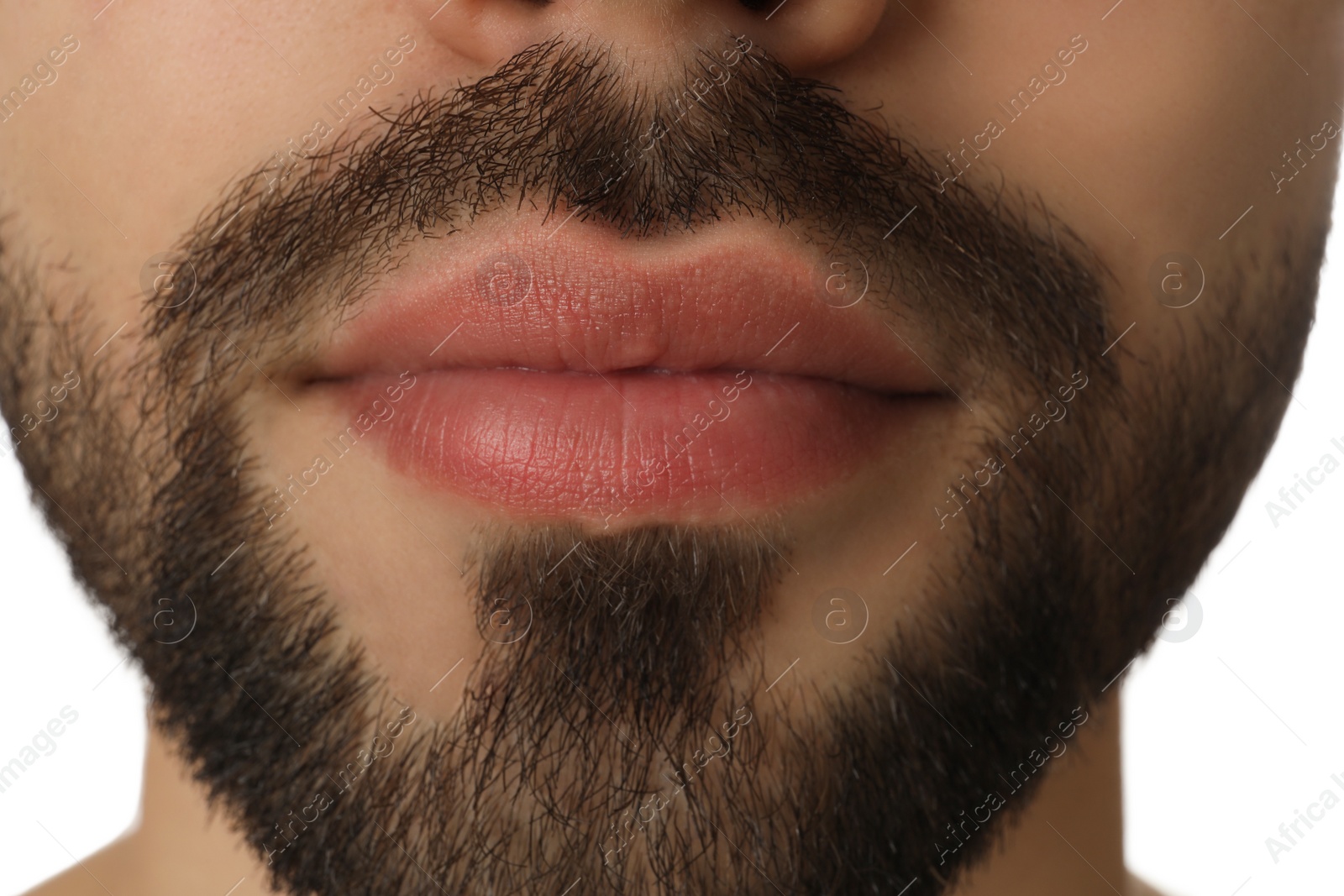 Photo of Young man with beard after shaving on white background, closeup