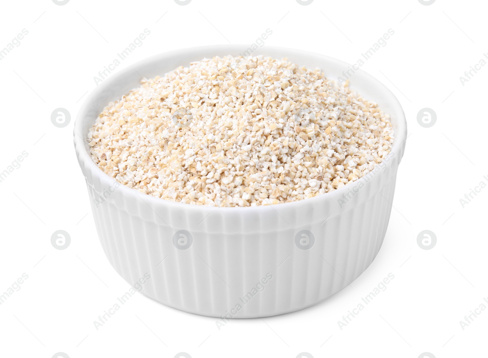 Photo of Dry barley groats in bowl isolated on white