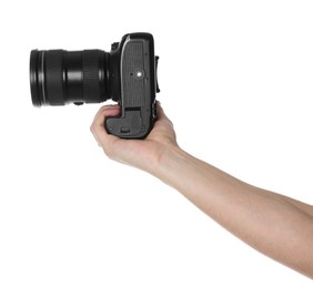 Photographer holding modern camera on white background, closeup