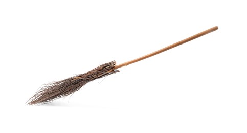 Old broom with wooden handle isolated on white