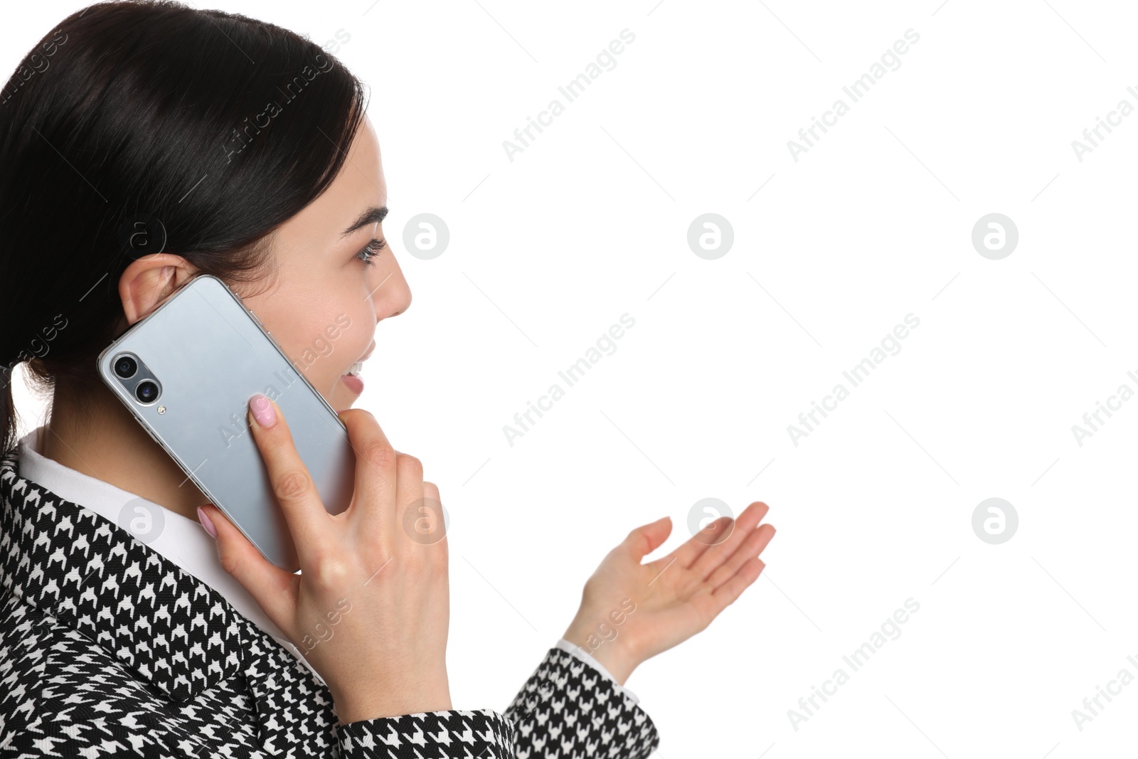 Photo of Young businesswoman talking on mobile phone against white background