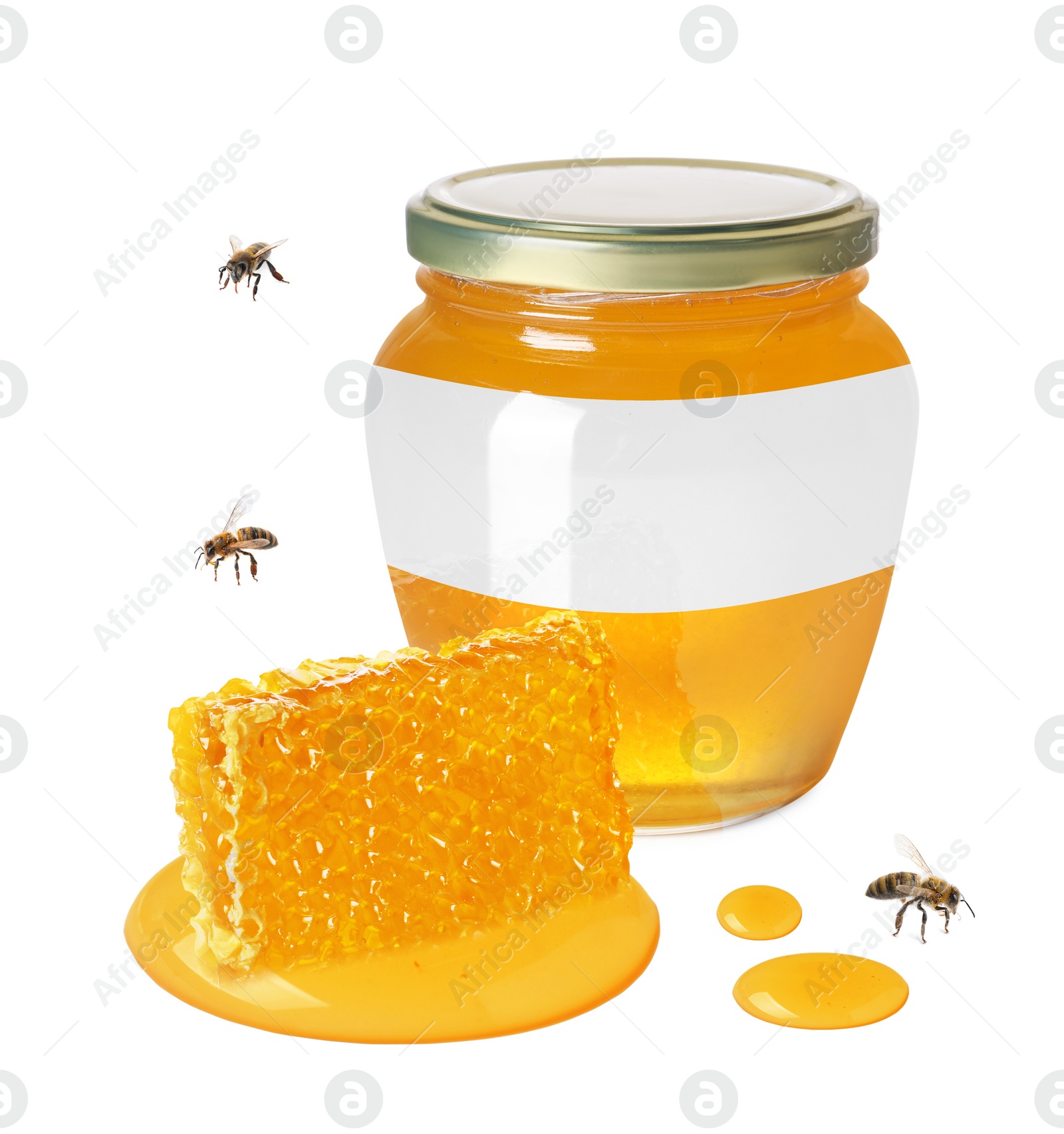 Image of Sweet honey in glass jar with blank label, piece of honeycomb and flying bees on white background. Mockup for design